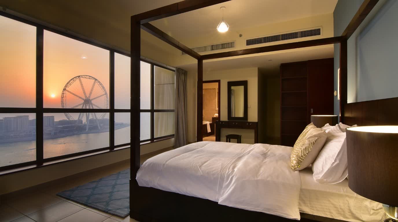 Downtown High-Rise Apartment — Luxury Bedroom